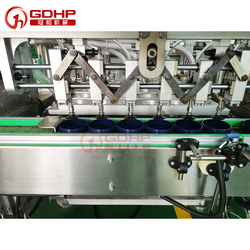 Cream filling machine, film sealer, capping and labeling machine production line