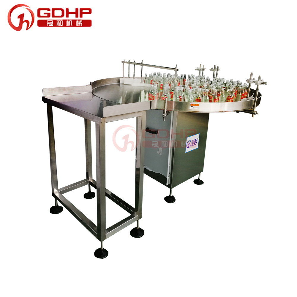 Disc bottle unscrambler machine